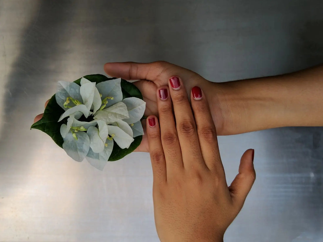 A woman with painted fingernails
