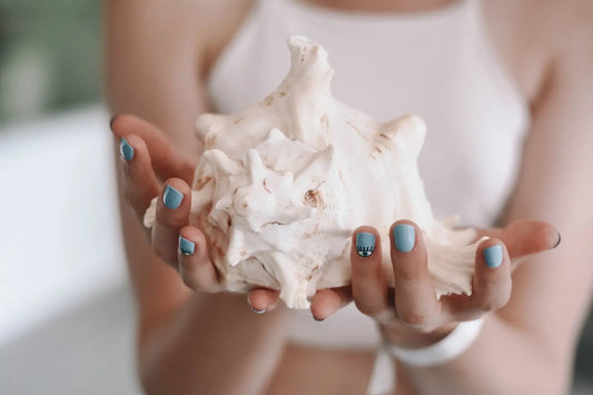 A woman with painted nails