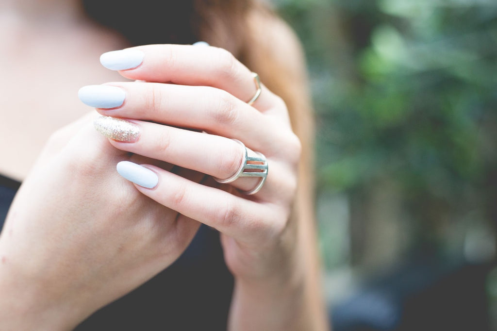 A woman with acrylic nails
