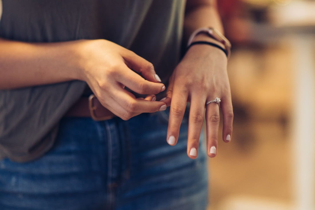 Woman painting her nails