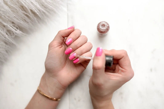 Lady painting her nails
