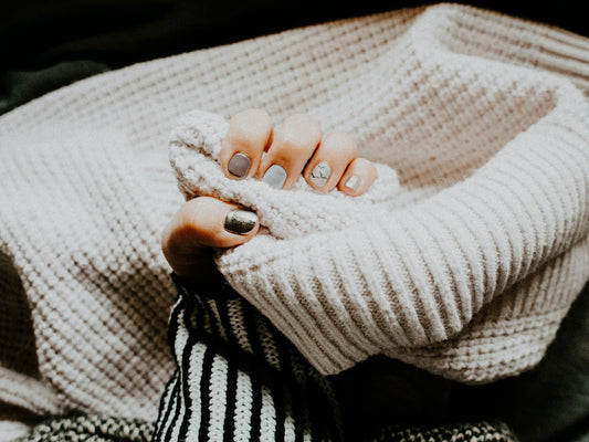 A hand with painted nails