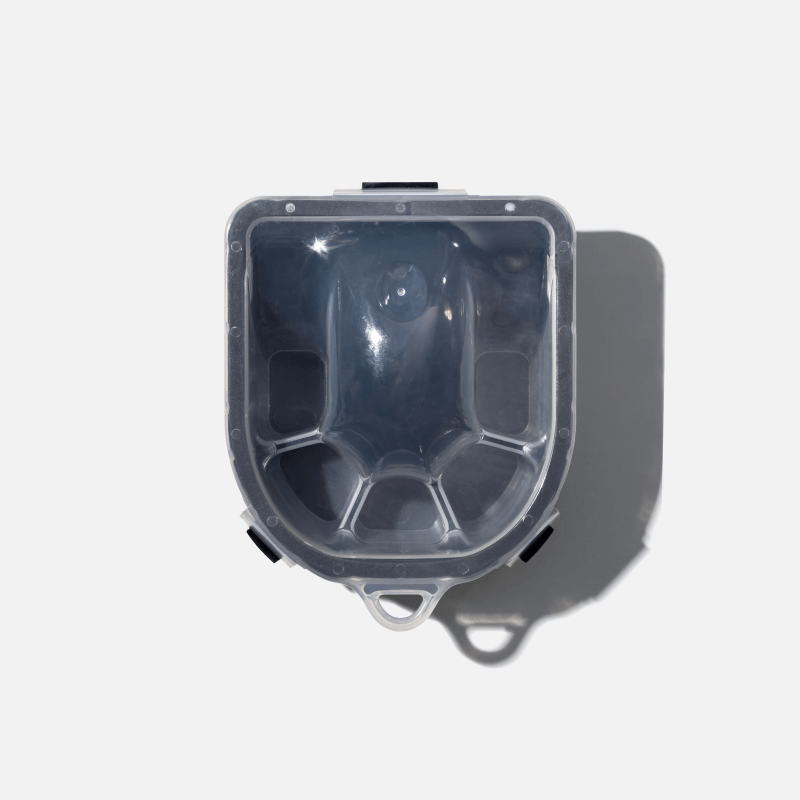 Transparent case against a white background, viewed from above.